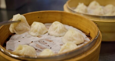 Sticker - Taiwan cuisine steamed soup bun in basket