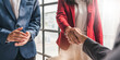 © wichayada - Business people shaking hands, finishing up meeting, business etiquette, congratulation, merger and acquisition concept.