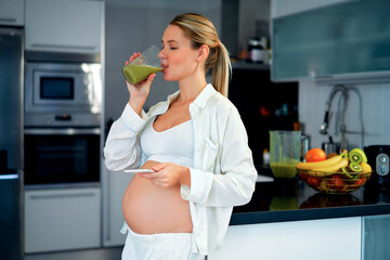 Wall Mural - Pregnant woman at home