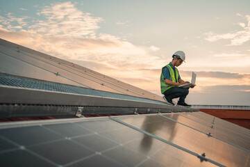 Service engineer checking solar cell on the roof for maintenance if there is a damaged part. Engineer worker install solar panel. Clean energy concept.