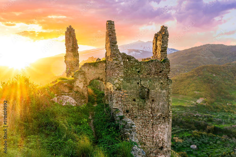 beautiful sunset or sunrise landscape of ancient ruins on a top of a ...