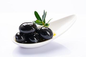 Delicious and appetizing olives on white background