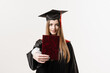 © Rabizo Anatolii - Student with diploma in graduation robe and cap ready to finish college. Future leader of science. Academician young woman in black gown smiling.