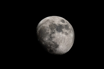 Wall Mural - the moon is earth's only natural satellite. it is the fifth largest satellite in the solar system