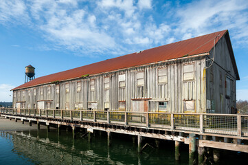 Wall Mural - Historic Cannery Buildings at the Semiahmoo Resort in Drayton Harbor, Washington. This is a remnant of the world’s largest cannery that was operated by the Alaska Packers’ Association.