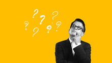 Asian Businessman Thinking Something With Question Marks On Yellow Background. Inspiration Trendy Idea Concept, Modern Design, Contemporary Art Collage.