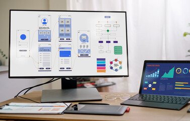 ux ui design on desktop and laptop computer screen working at home.mobile app interface design