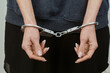 © Евгений Порохин - women's hands are handcuffed in close-up