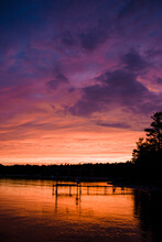 Dramatic Purple, Pink And Orange Clouds At Sunset Over Lake Michigan