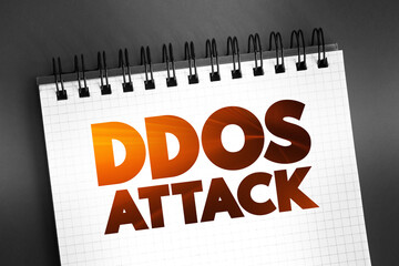Poster - DDOS Attack occurs when multiple machines are operating together to attack one target, text concept on notepad