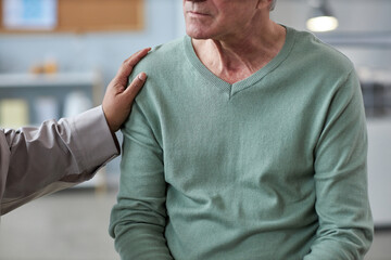 Wall Mural - Close up of senior man sharing in mental health support group for elderly people