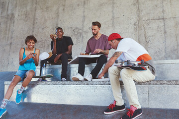 Sticker - Everything is better when were together. a group of skaters having lunch together.