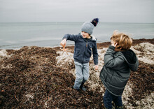 Young Boys Discover Starfish