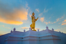 Golden Standing Buddha,Buddha Image Or Buddha Statue; Standing Buddha Image With Sunlight Ray At Nong Pai Lom Temple.