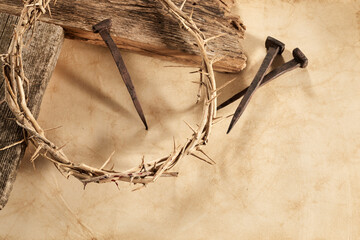 Wall Mural - Crucifixion Of Jesus Christ. Cross With three Nails And Crown Of Thorns on ground