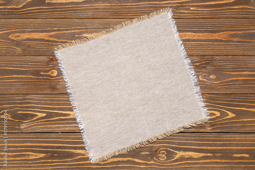 Sack napkin on wooden background