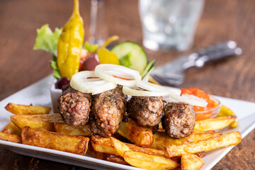 Canvas Print - cevapcici with french fries