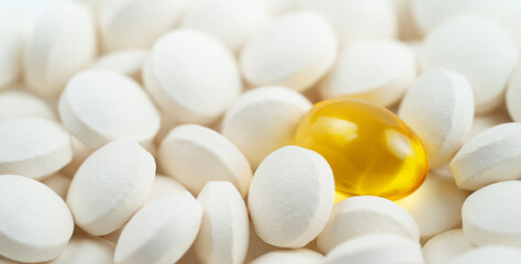 Wall Mural - Omega 3 softgel capsule against white pills.