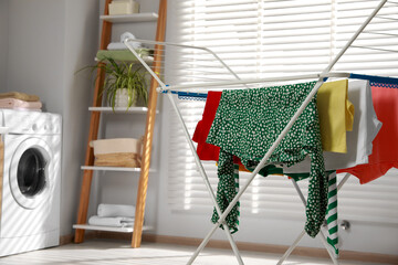 Canvas Print - Different apparel drying on clothes airer in bathroom, space for text