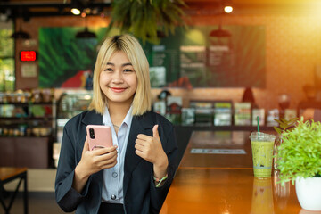 With a swipe of her thumb, the beautiful business girl approved the latest proposal and closed yet another successful deal.