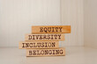 © Uuganbayar - Equity, diversity, inclusion and belonging symbol. Wooden blocks with words 'equity, diversity, inclusion, belonging' on brown background. Diversity, equity, inclusion and belonging concept.