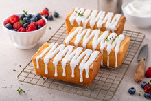 Classic Pound Cake With Powdered Sugar Glaze Dripping Over