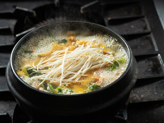 Canvas Print - Stew boiling in an earthenware pot	