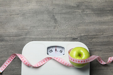 diet and weight loss, healthy lifestyle, composition with measuring tape, space for text
