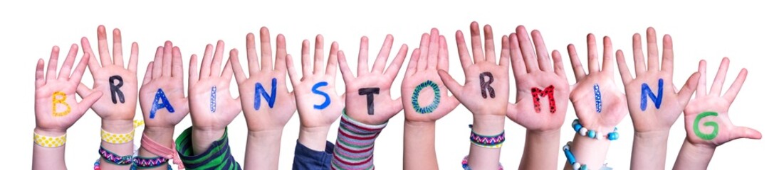 Wall Mural - Children Hands Building Word Brainstorming, Isolated Background