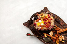Ashure, Turkish Dessert Porridge. Traditional Turkish Cuisine. Noah's Pudding. Sweet Porridge, Which Consists Of Grains, Fruits, Dried Fruits And Nuts