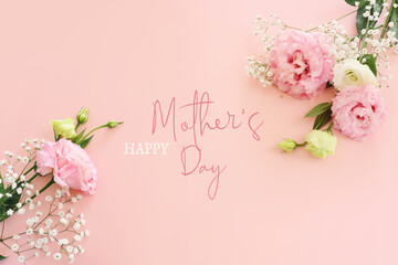 mother's day concept with pink flower over pastel background