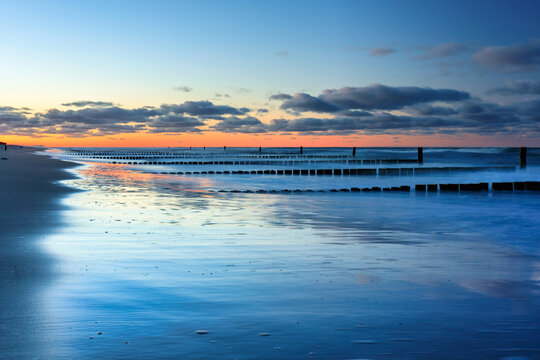 beautiful baltic sea beach on the hel peninsula at sunset. poland