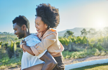 Canvas Print - Love, black couple and piggy back in countryside, travelling and bonding for vacation, relationship and break. Romance, man carry woman and loving on weekend, holiday and honeymoon to relax and smile