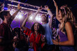 © bernardbodo - Young crowd dancing at concert