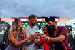 © bernardbodo - Friends drinking at summer music festival