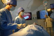 © FotoArtist - Medical Team Performing Surgical Operation in Modern Operating Room. inside operation room