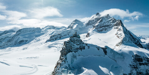 Wall Mural - Aerial panorama view of the Sphinx Observatory on Jungfraujoch - Top of Europe, one of the highest observatories in the world located at the Jungfrau railway station, Bernese Oberland, Switzerland.