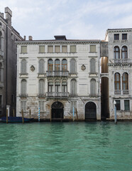 Beautiful charming facade of an old building in Venice, Italy