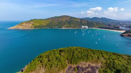 Wall Mural - 4K Hyperlapse aerial drone fly over island to Nai Han beach, Phuket, Thailand
