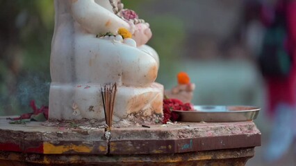 Canvas Print - Closeup view of a burning candle in a temple