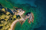 Fototapeta Do akwarium - Rocky shore of Aegean sea, aerial top down view