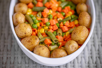 Wall Mural - Boiled mini Potato With Vegetables dish