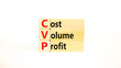 © Dzmitry - CVP cost volume profit symbol. Concept words CVP cost volume profit on wooden blocks on a beautiful white table white background. Business and CVP cost volume profit concept. Copy space.