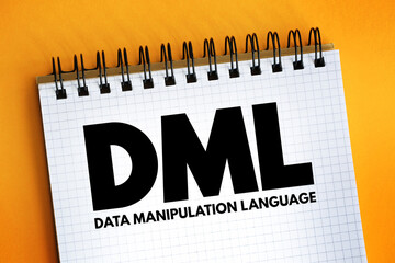 Aufkleber - DML - Data Manipulation Language acronym text on notepad, abbreviation concept background