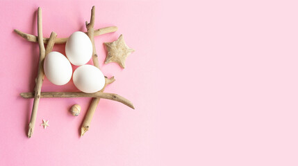 Easter composition with white eggs and marine decorative elements.