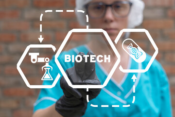 Wall Mural - Doctor or laboratory assistant using virtual touchscreen presses inscription: BIOTECH. Concept of biotech laboratory. Bio tech molecule or gene for dna medical services. Biotechnology.