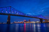 Fototapeta Nowy Jork - Montreal, the Jacques Cartier Bridge was the first in the world to be connected, it presents a light show by Moment Factory.