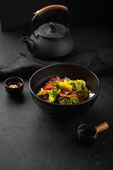 Wall Mural - Bowl of asian cooked rice with beef and vegetables