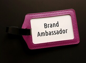 Purple ID card holder with text BRAND AMBASSADOR, refer to person employed by organization or business owner to represent brand in positive image to increase brand awareness