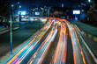 Car traffic light at night city.